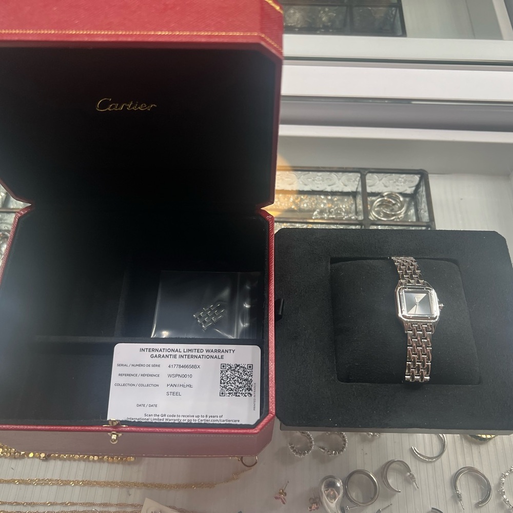 AVAILABLE- CARTIER black face watch